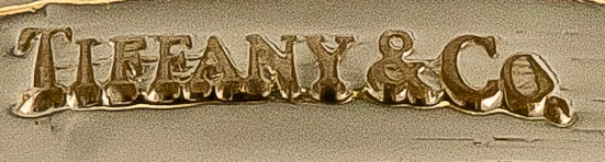 This is an image of a Tiffany's Maker Mark on Gold Jewelry.