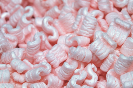 This is an image of a pile of styrofoam peanuts. It represents packing materials used in shipping. 